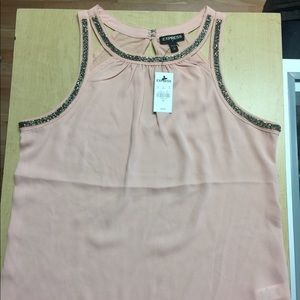This is a beautiful Express blouse.Brand New
